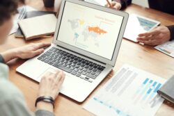 Laptop with world map displayed