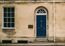 Oxford English style door on stone wall