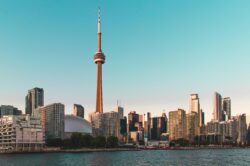 Picture of Toronto skyline on the water during a sunny day