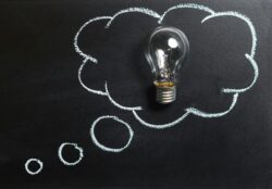Lightbulb inside a thought bubble
