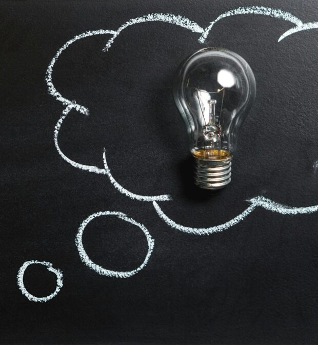Lightbulb inside a thought bubble