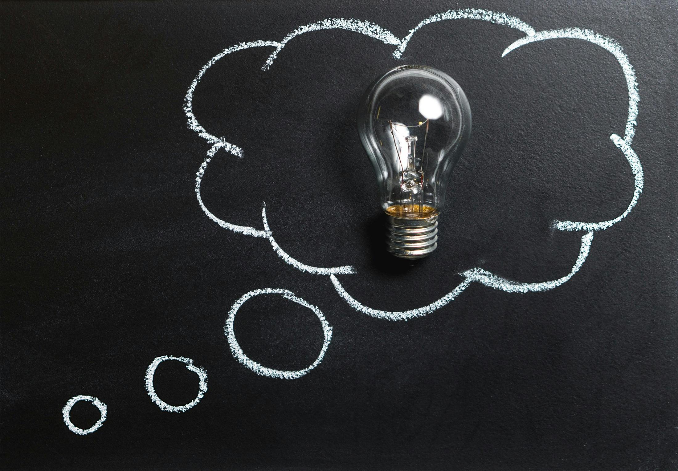 Lightbulb inside a thought bubble