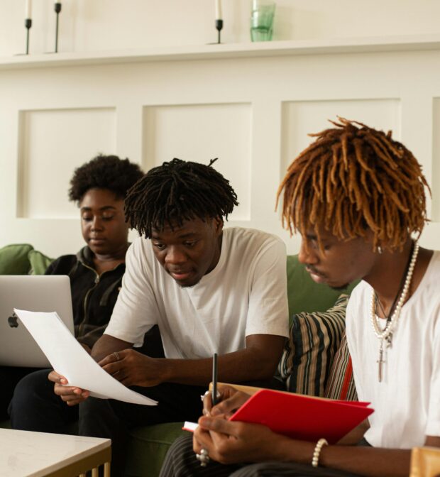 Three People Studying Together