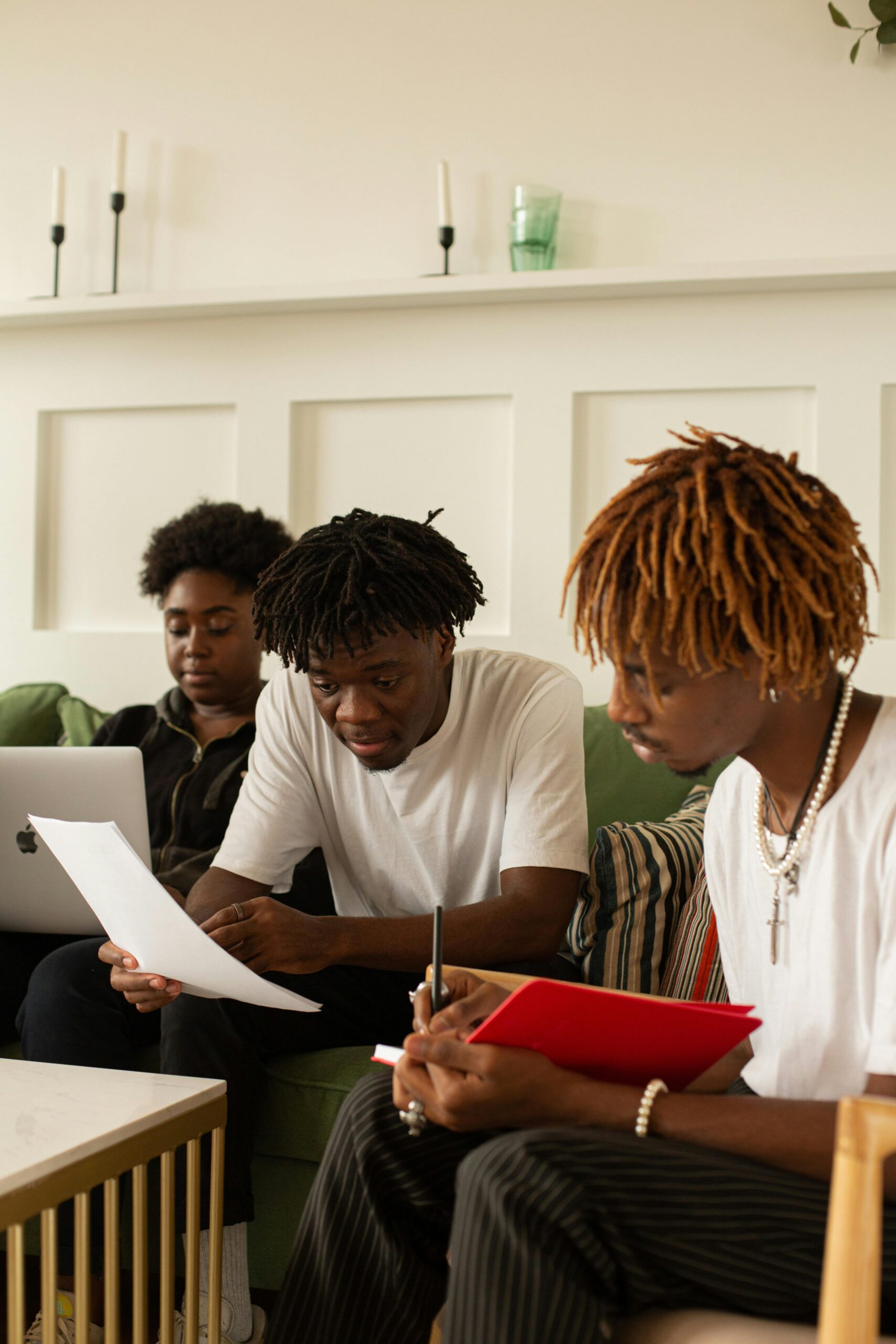 Three People Studying Together