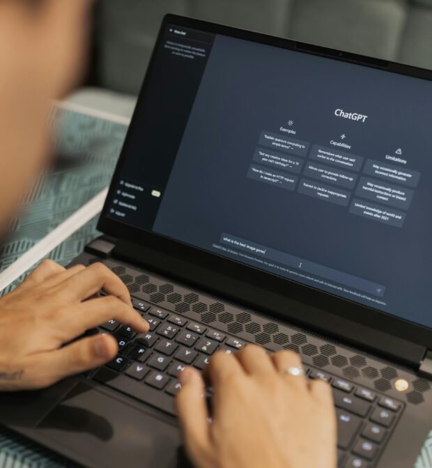 Man Using Laptop with Chat GPT