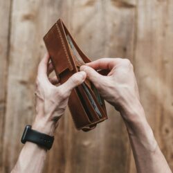 Close up of Hands Holding Wallet