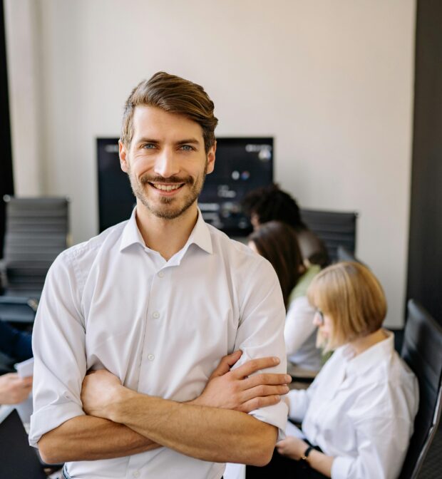 Man in White Long Sleeve Shirt Smiling