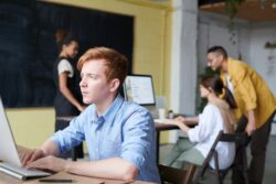 Photo Of Man Using Computer