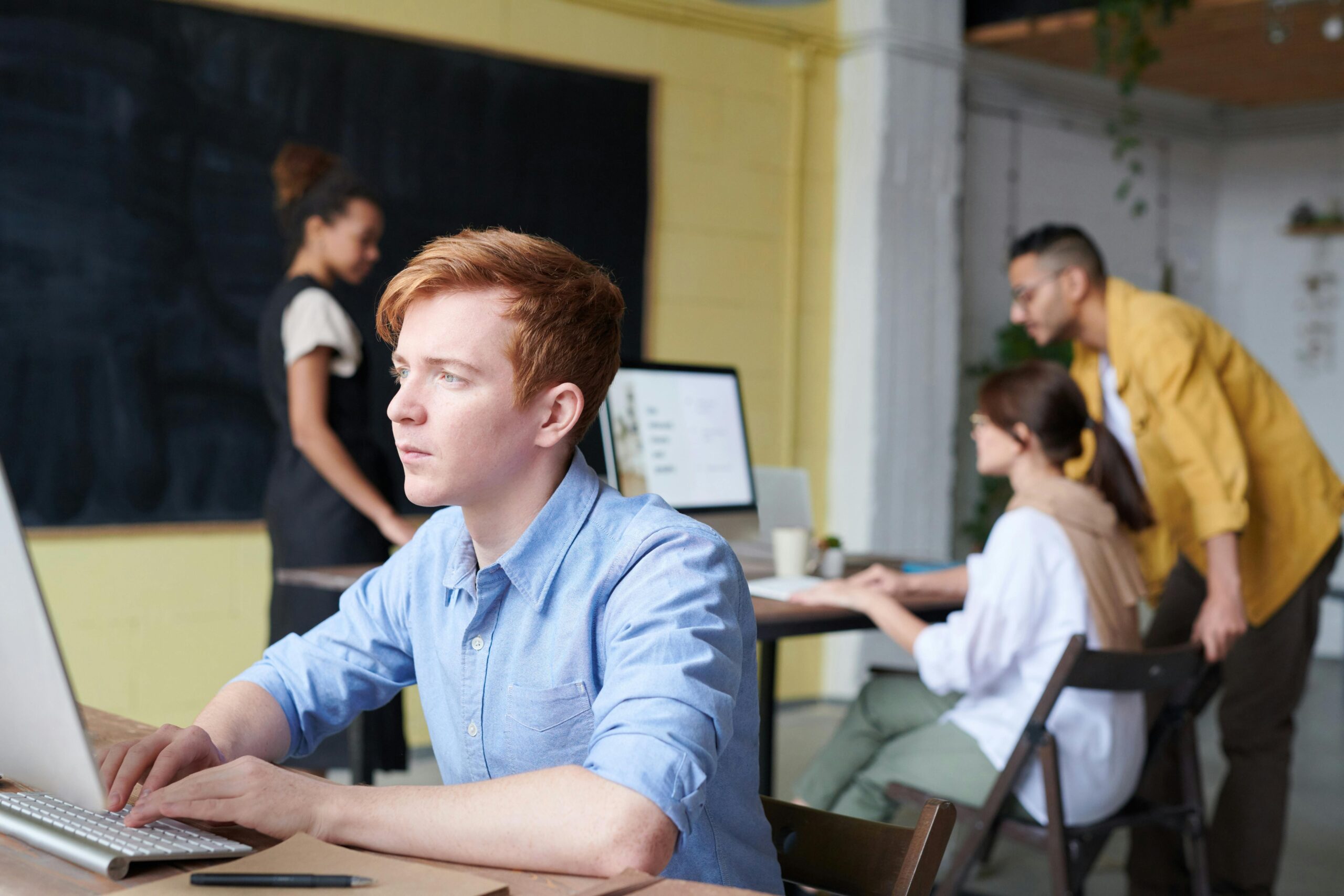 Photo Of Man Using Computer
