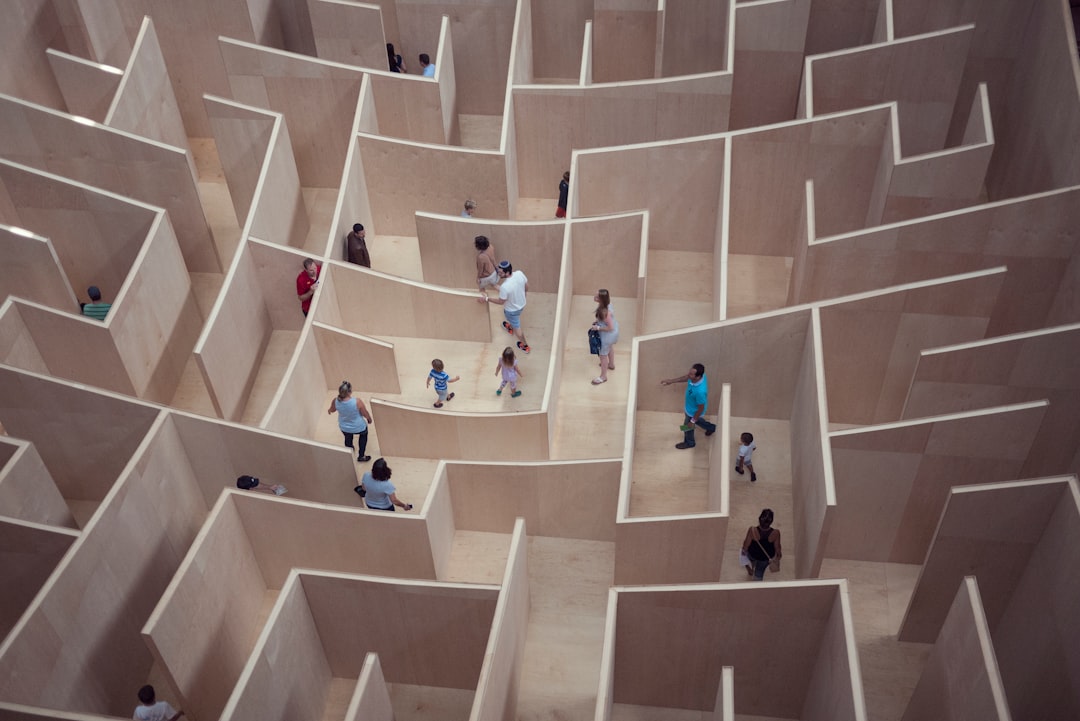 people sitting on white concrete stairs
